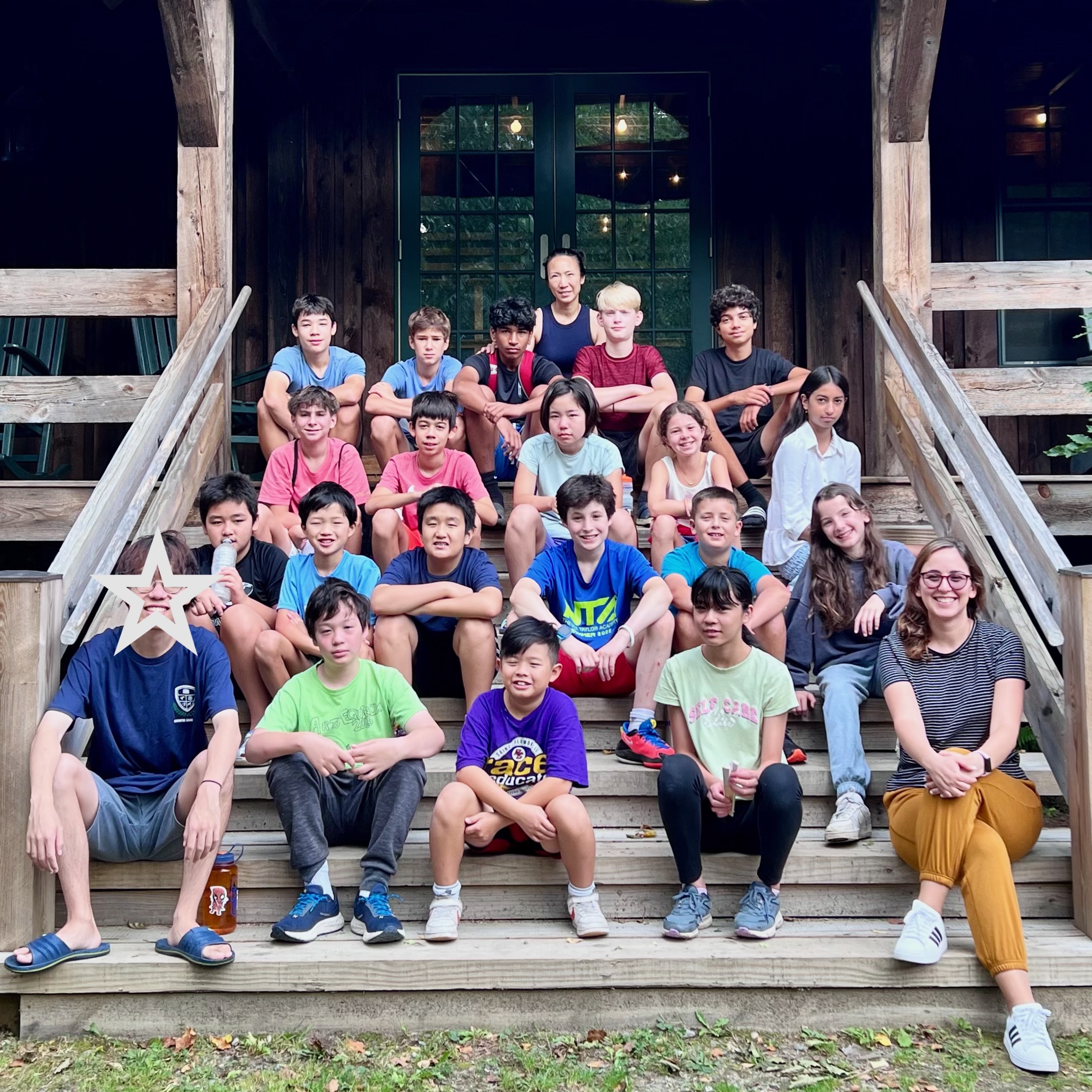 WSA students and teachers gathered on the steps of Bluewater Lodge during the annual retreat
